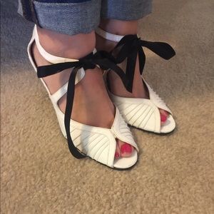 White and black ribbon heels